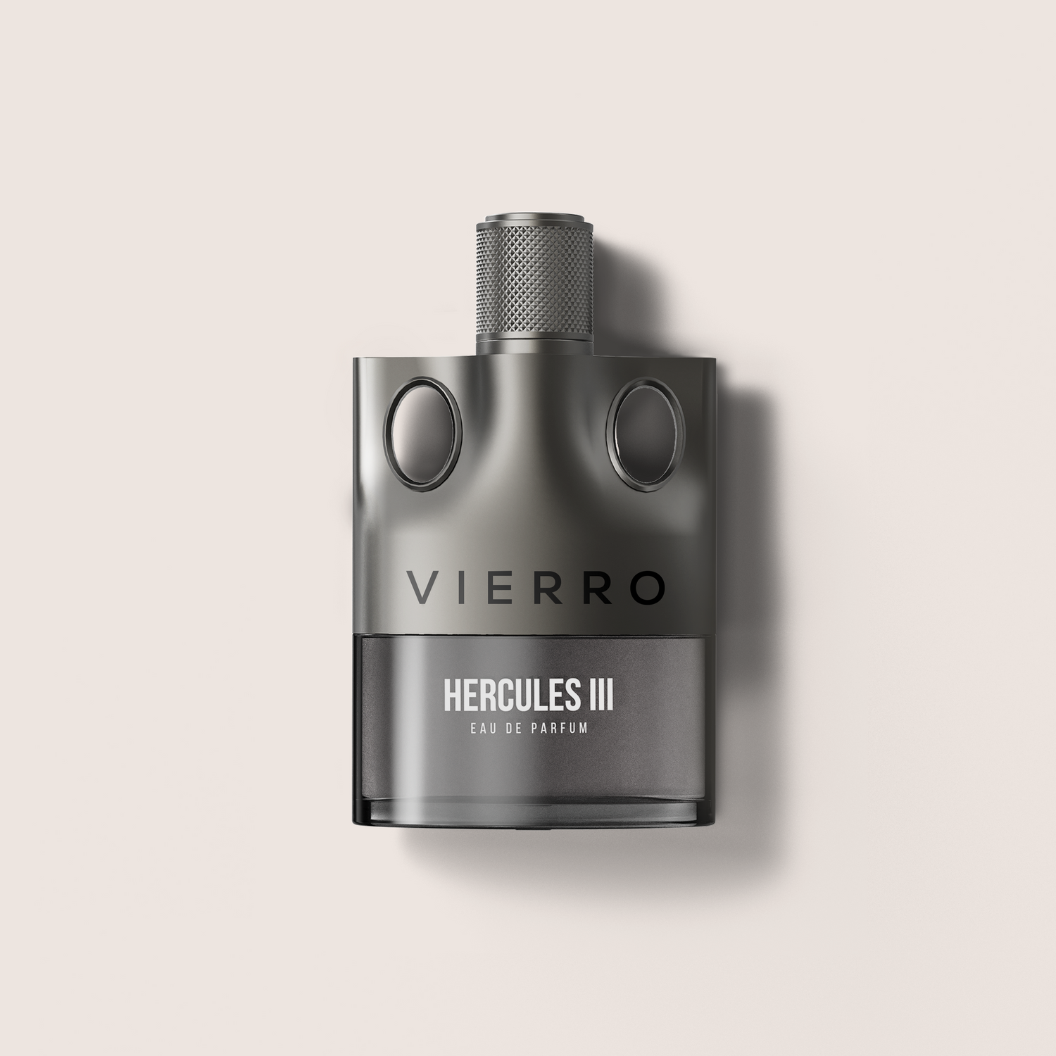 A matte dark gray bottle of Vierro Hercules III Eau de Parfum, featuring a textured metallic cap and a clean, modern design, set against a solid light beige background with a soft shadow.