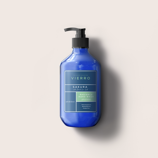 A 500ml blue pump bottle of Vierro Sakura Hand Wash against a neutral light background.